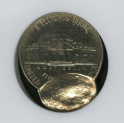 1993 Jefferson nickel off-center strike error showing shifted design and blank planchet area on one side