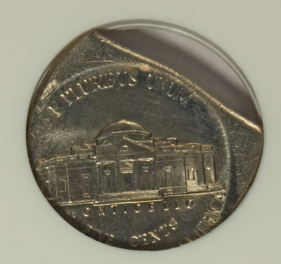 1993 Jefferson nickel clipped planchet error showing curved missing area on coin edge